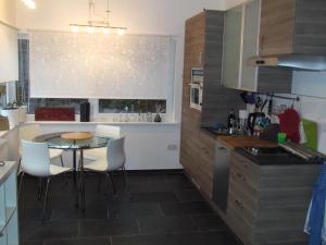 Köök või kööginurk majutusasutuses Romantic Hideaway