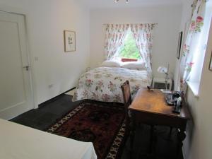 Voodi või voodid majutusasutuse Romantic Hideaway toas