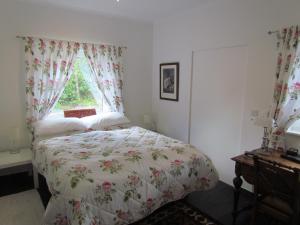 Voodi või voodid majutusasutuse Romantic Hideaway toas