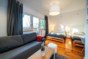 Posteľ alebo postele v izbe v ubytovaní Gabi Apartament Zakopane