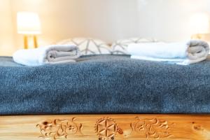 Posteľ alebo postele v izbe v ubytovaní Gabi Apartament Zakopane