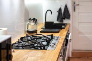 Kuchyňa alebo kuchynka v ubytovaní Gabi Apartament Zakopane