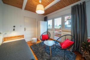 Posteľ alebo postele v izbe v ubytovaní Gabi Apartament Zakopane