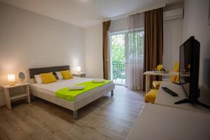 Postel nebo postele na pokoji v ubytování Villa Odobasic Rooms