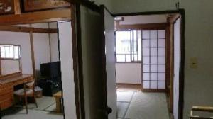 TV a/nebo společenská místnost v ubytování Guesthouse Yoshikawa + 5 fotografií