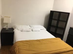 Postel nebo postele na pokoji v ubytování Hotel Mini Inc