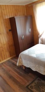 Postel nebo postele na pokoji v ubytování Cabaña Quiquel, Dalcahue, Chiloe