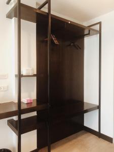 Postel nebo postele na pokoji v ubytování T-NEE Hotel@Udon