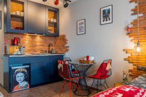 Η κουζίνα ή μικρή κουζίνα στο New Gudauri, Loft 2, Baker Street Apartment