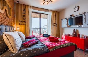 Μια τηλεόραση ή/και κέντρο ψυχαγωγίας στο New Gudauri, Loft 2, Baker Street Apartment