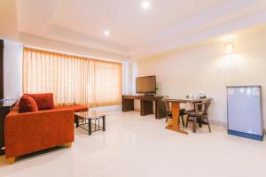 Kuchyň nebo kuchyňský kout v ubytování Royal Princess City Lamphun Hotel