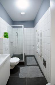 Kylpyhuone majoituspaikassa Pacman Apartment