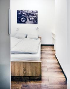 Posteľ alebo postele v izbe v ubytovaní Pacman Apartment
