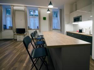 Kuchyňa alebo kuchynka v ubytovaní Pacman Apartment