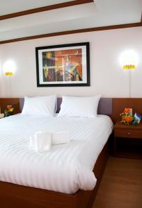 Ein Bett oder Betten in einem Zimmer der Unterkunft Cordial serviced apartment