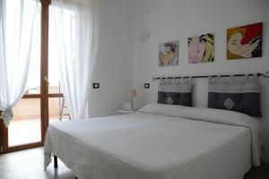 Łóżko lub łóżka w pokoju w obiekcie Villa Tuscia