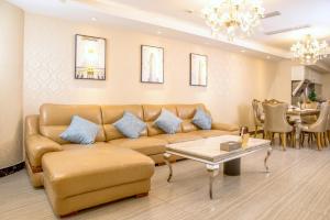 Area soggiorno di Guangzhou Pengman Apartment Zhengjia Huanshi Branch