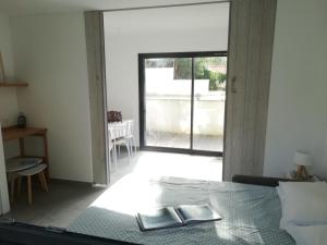 Postel nebo postele na pokoji v ubytování Villa Paradis