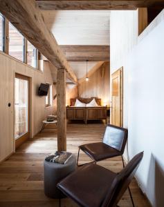 Postel nebo postele na pokoji v ubytování HOLZGAUER HAUS + 35 fotografií