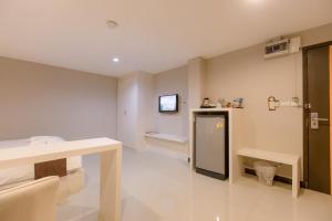 Η κουζίνα ή μικρή κουζίνα στο De Hug Hotel & Residence