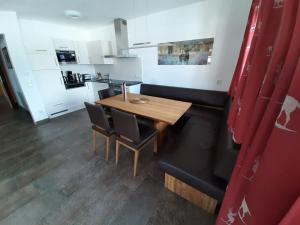 Kuchyň nebo kuchyňský kout v ubytování Alpin Residenz Panoramabahn Kitzbühel