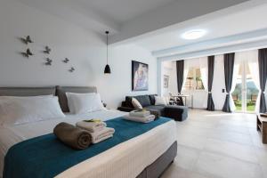 Posteľ alebo postele v izbe v ubytovaní Ionian Sun