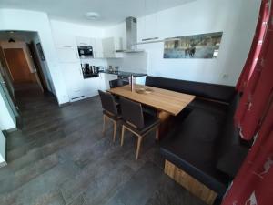 Kuchyň nebo kuchyňský kout v ubytování Alpin Residenz Panoramabahn Kitzbühel