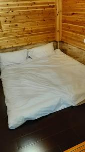 Letto o letti in una camera di Yanyu Xihu Villa