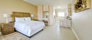 Postel nebo postele na pokoji v ubytování Settle inn Self Catering Units
