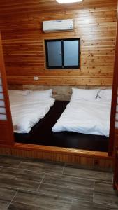 Letto o letti in una camera di Yanyu Xihu Villa