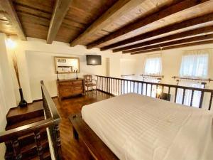 Postel nebo postele na pokoji v ubytování Boutique Hotel Del Doge