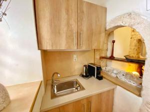 Kuchyň nebo kuchyňský kout v ubytování Boutique Hotel Del Doge