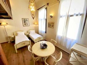 Postel nebo postele na pokoji v ubytování Boutique Hotel Del Doge