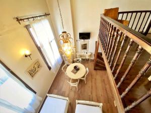 TV a/nebo společenská místnost v ubytování Boutique Hotel Del Doge