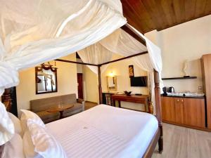 Postel nebo postele na pokoji v ubytování Boutique Hotel Del Doge
