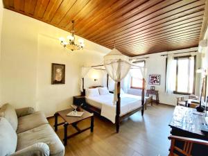 Postel nebo postele na pokoji v ubytování Boutique Hotel Del Doge