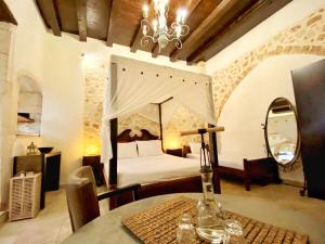 Postel nebo postele na pokoji v ubytování Boutique Hotel Del Doge