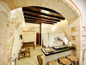 Postel nebo postele na pokoji v ubytování Boutique Hotel Del Doge