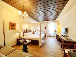 Postel nebo postele na pokoji v ubytování Boutique Hotel Del Doge