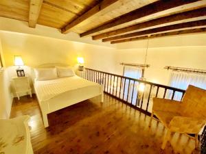 Postel nebo postele na pokoji v ubytování Boutique Hotel Del Doge