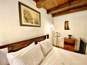 Postel nebo postele na pokoji v ubytování Boutique Hotel Del Doge