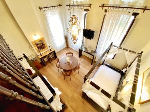 Postel nebo postele na pokoji v ubytování Boutique Hotel Del Doge