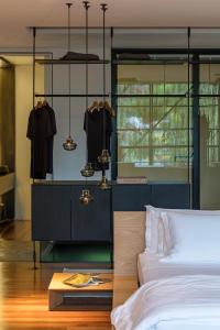 Postel nebo postele na pokoji v ubytování Felissimo Exclusive Hotel