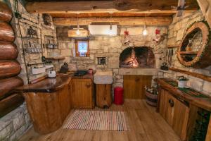 Kuchyň nebo kuchyňský kout v ubytování Bistrica Cottage