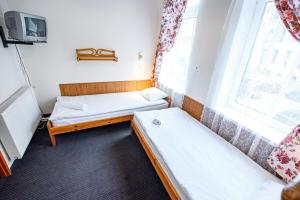 Posteľ alebo postele v izbe v ubytovaní Willa Safona