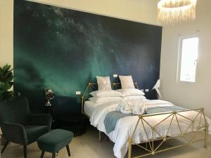 Voodi või voodid majutusasutuse Burano Yellow Villa toas