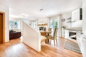 Kuchyňa alebo kuchynka v ubytovaní Haus Capricorn - Garten Appartement