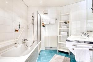 Kúpeľňa v ubytovaní Haus Capricorn - Garten Appartement