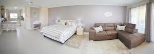 Postel nebo postele na pokoji v ubytování Settle inn Self Catering Units