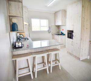 Kuchyň nebo kuchyňský kout v ubytování Settle inn Self Catering Units